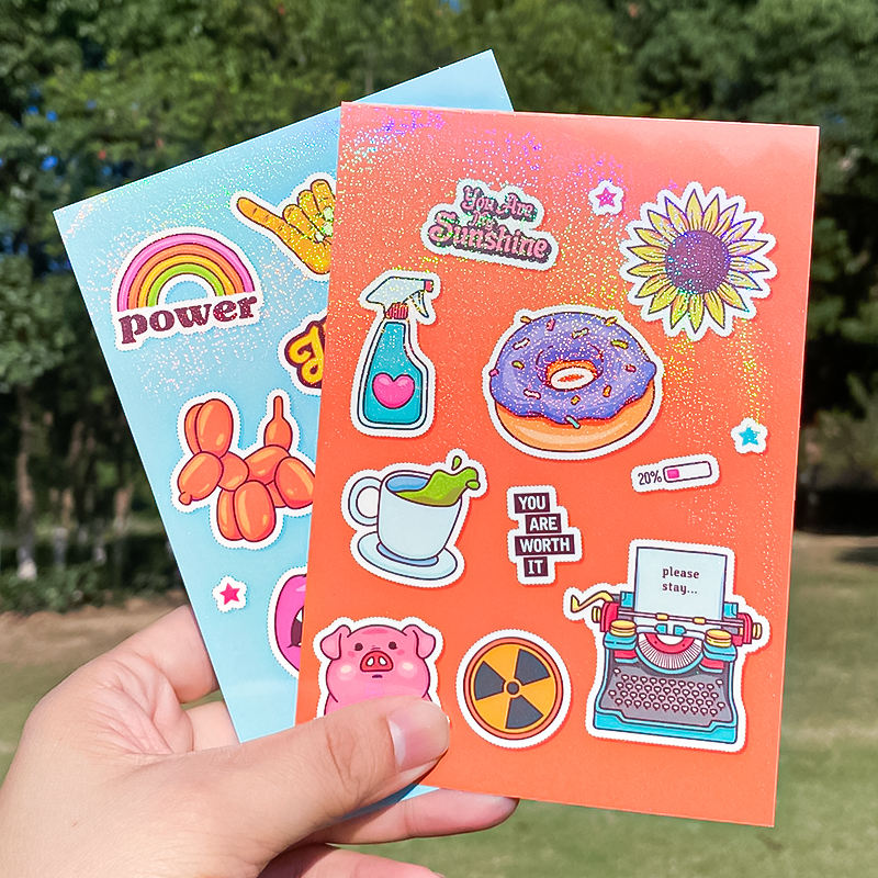 Custom glitter sticker sheets with sparkling finish showing vibrant full-color designs - Sticker Sheet Printing