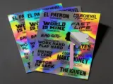 Holographic vinyl sticker sheets close-up showing print detail and rainbow reflection - Sticker Sheet Printing