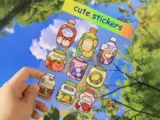 Clear sticker sheets printed on transparent vinyl with vibrant full-color designs - Sticker Sheet Printing