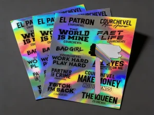 Holographic vinyl sticker sheets close-up showing print detail and rainbow reflection - Sticker Sheet Printing