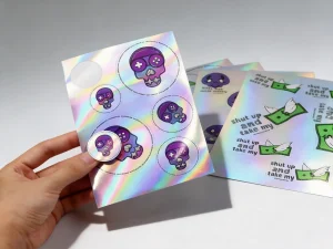 Hologram sticker sheet showing rainbow prismatic reflection with multiple kiss-cut stickers - Sticker Sheet Printing
